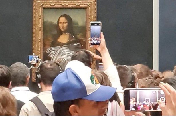 Attack on Monalisa Painting with Cake